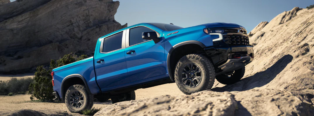 2026 Chevrolet Silverado 1500 climbing a rock
