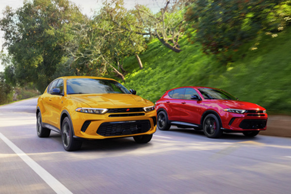 Red and yellow 2025 Dodge Hornets equipped with the Track Pack package. 2026 Dodge Hornet design features at Tarrabain Motor Products in Lac La Biche, AB