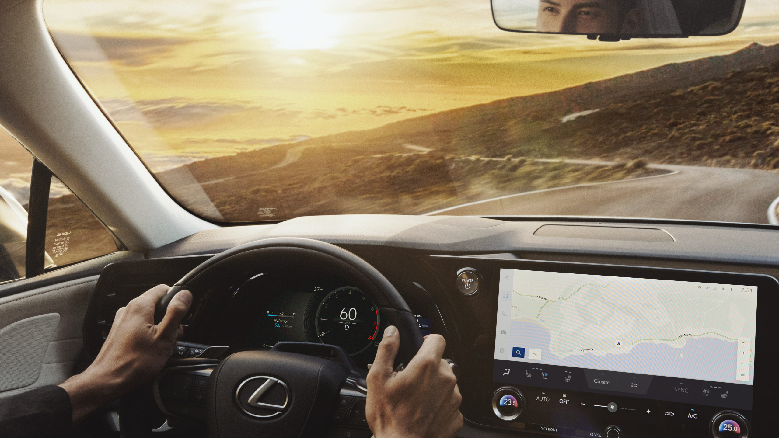 A rear view of the 2026 Lexus RX 450h in deep blue, highlighting its sculpted lines, LED light bar, and refined aerodynamic styling. Available at Tony Graham Lexus in Ottawa, the RX delivers a perfect balance of performance and luxury in gas, hybrid, and plug-in hybrid options.