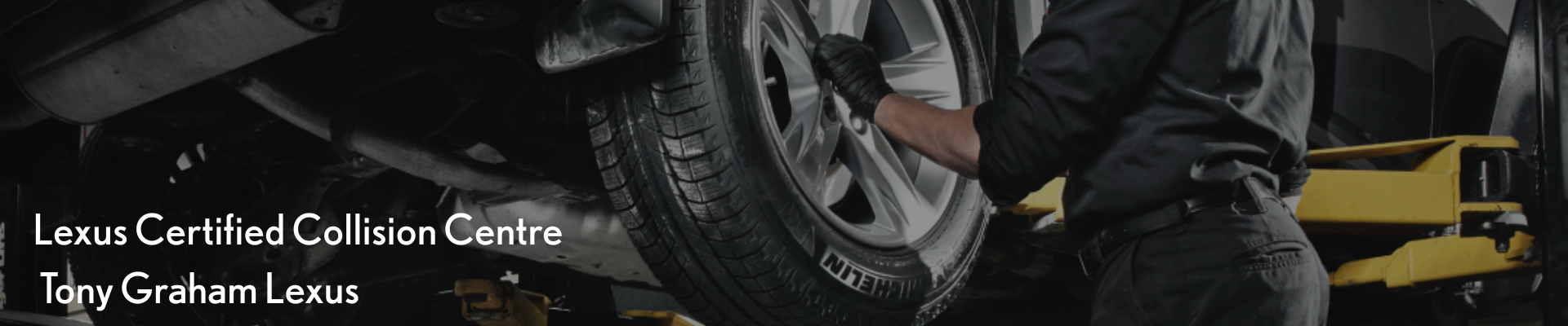 Lexus certified technician performing vehicle inspection and repair at Tony Graham Lexus Collision Centre Ottawa.