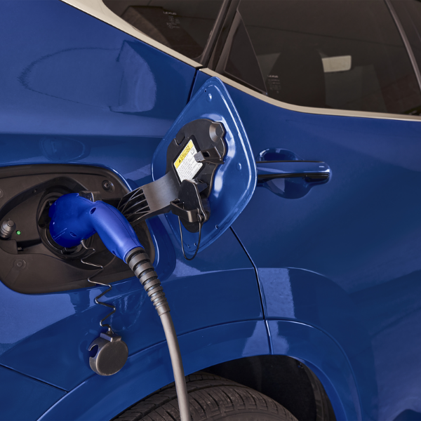 2026 Lexus NX 450h+ Plug-In Hybrid charging port connected to home Level 2 charger
