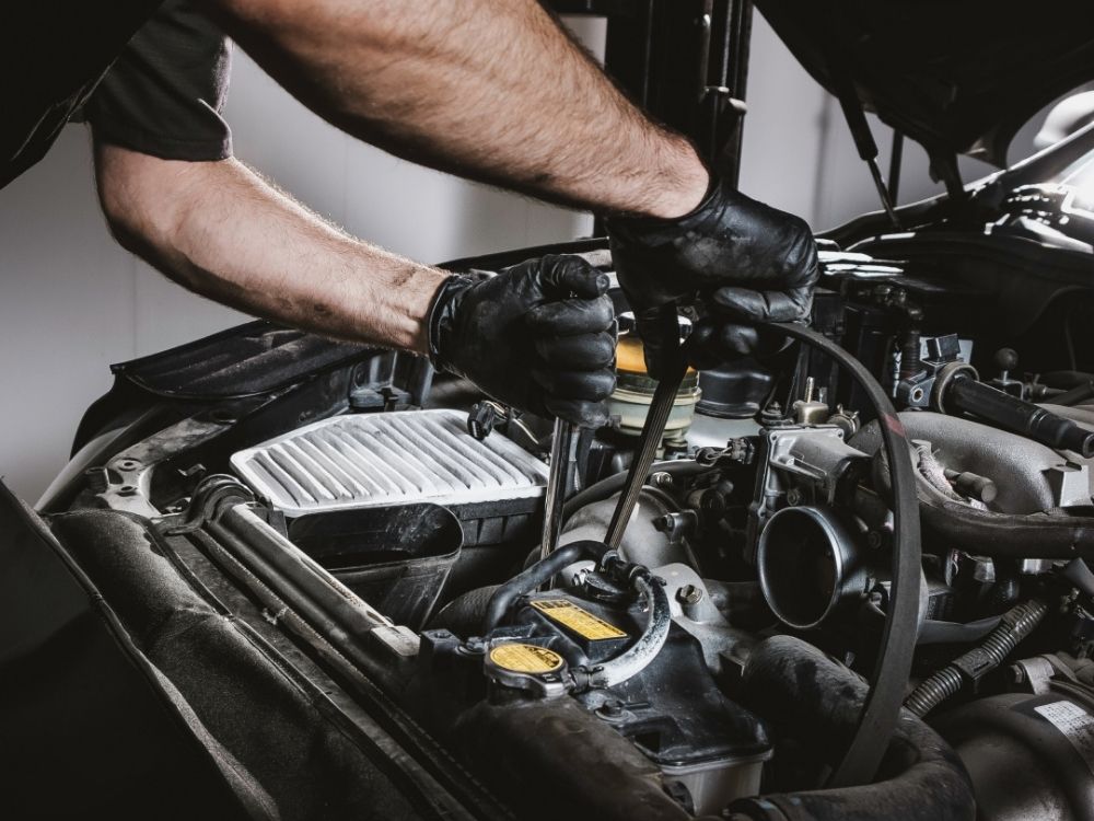 Lexus technician performing certified pre-owned inspection at Tony Graham Lexus