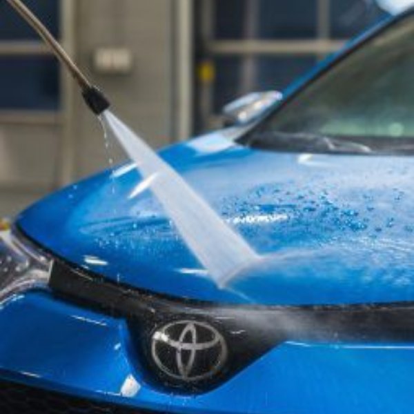 Toyota Touch Technician Cleaning a Toyota Vehicle at Tony Graham Toyota