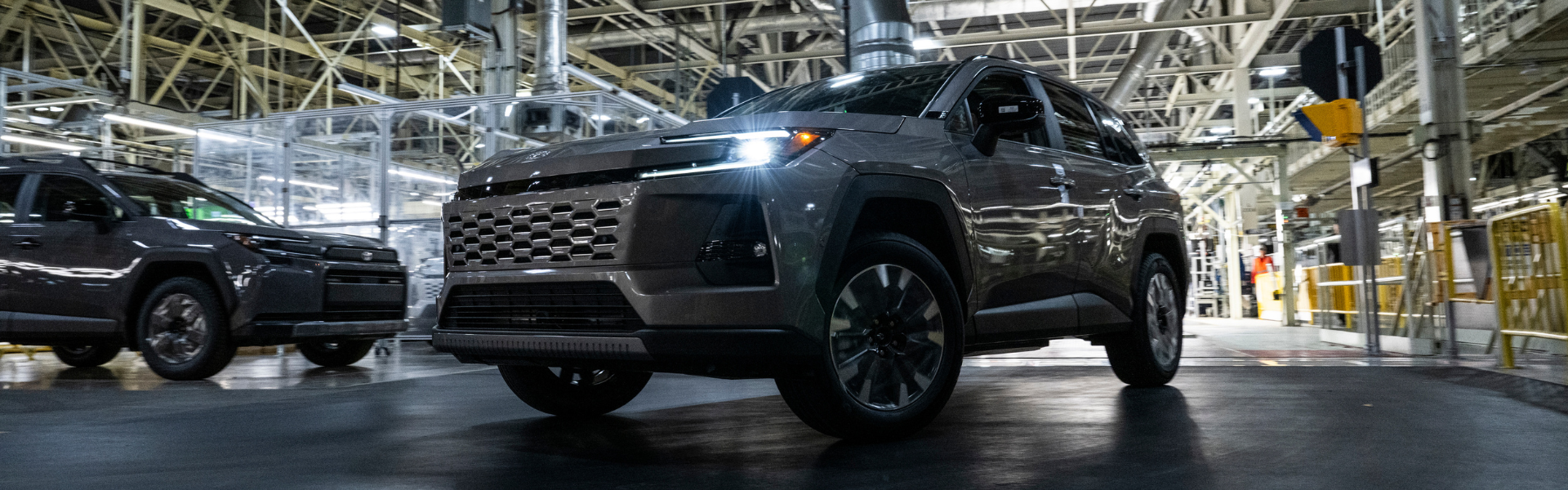Toyota RAV4 driving through factory assembly line during final production stage