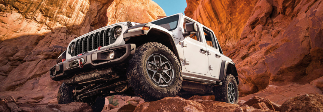 2024 Jeep Wrangler driving off-road