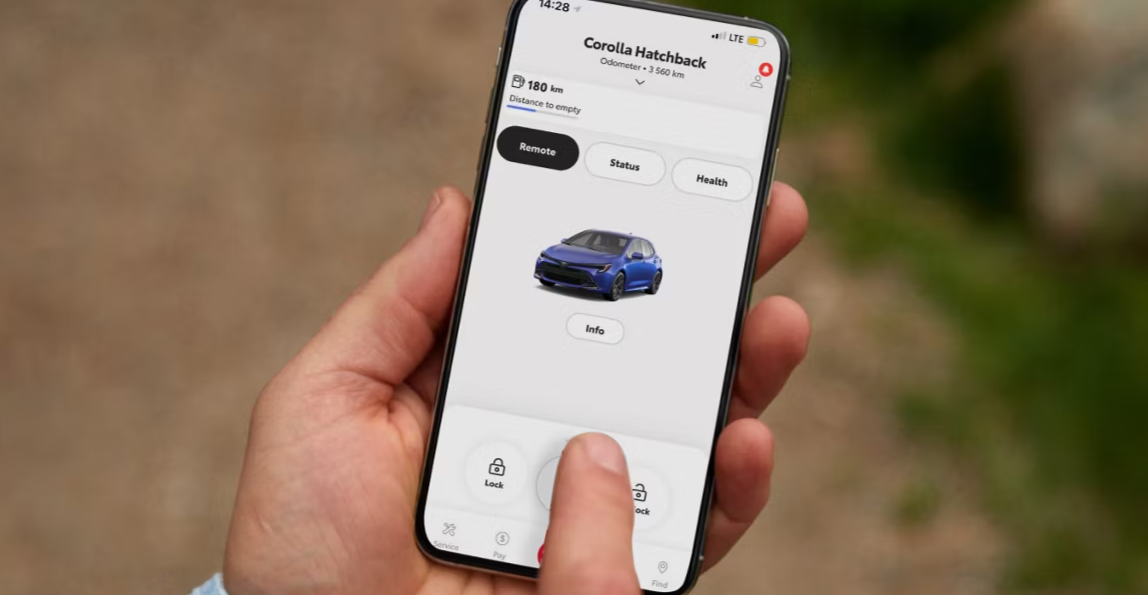 Person using Toyota Remote Connect.
