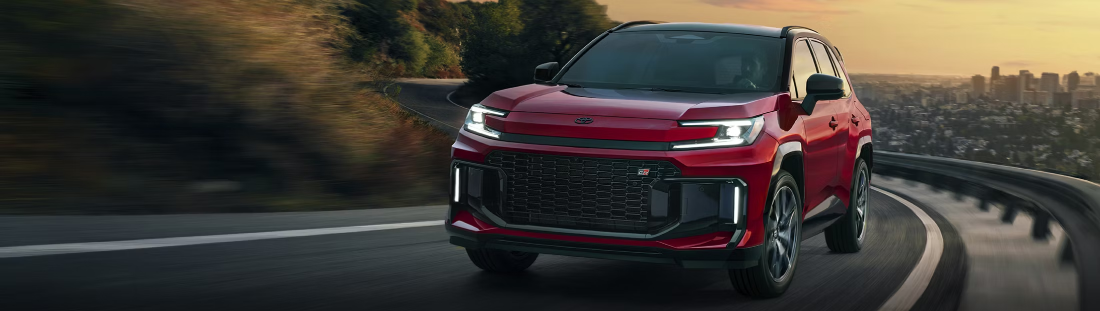 2026 Toyota RAV4 PHEV driving up road