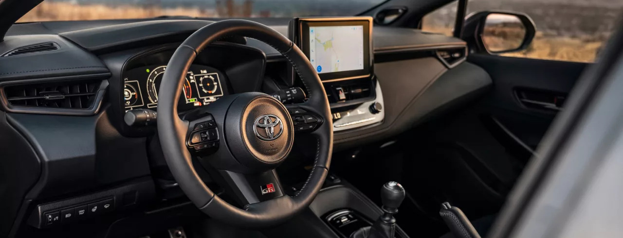 2026 Toyota GR Corolla black steering wheel and dashboard