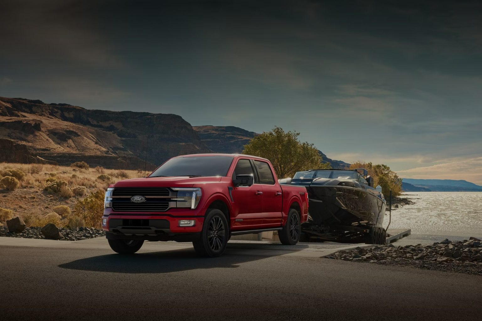 2026 Ford F-150 Platinum in Agate Black, showcasing its bold front grille and LED lighting