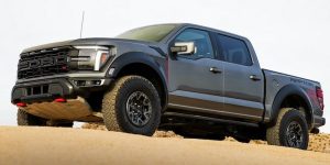 A 2026 Ford F-150 tackles a hill.