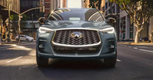Shot of 2025 INFINITI QX55 from the front in daylight on city street