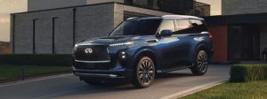 2026 INFINITI QX80 parked on driveway.