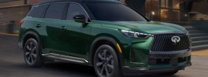 2026 INFINITI QX60 driving down road