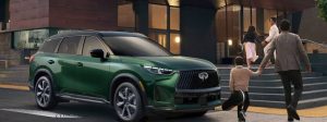 2026 qx60 parked outdoors with people walking by