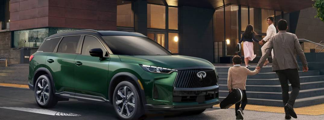 2026 qx60 parked outdoors with people walking by
