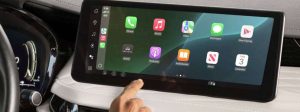 Unknown person using Apple CarPlay inside 2027 INFINITI QX65.