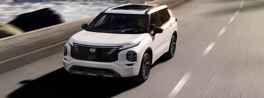 2026 Nissan Rogue PHEV driving on road