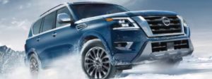 Nissan Armada driving through snow
