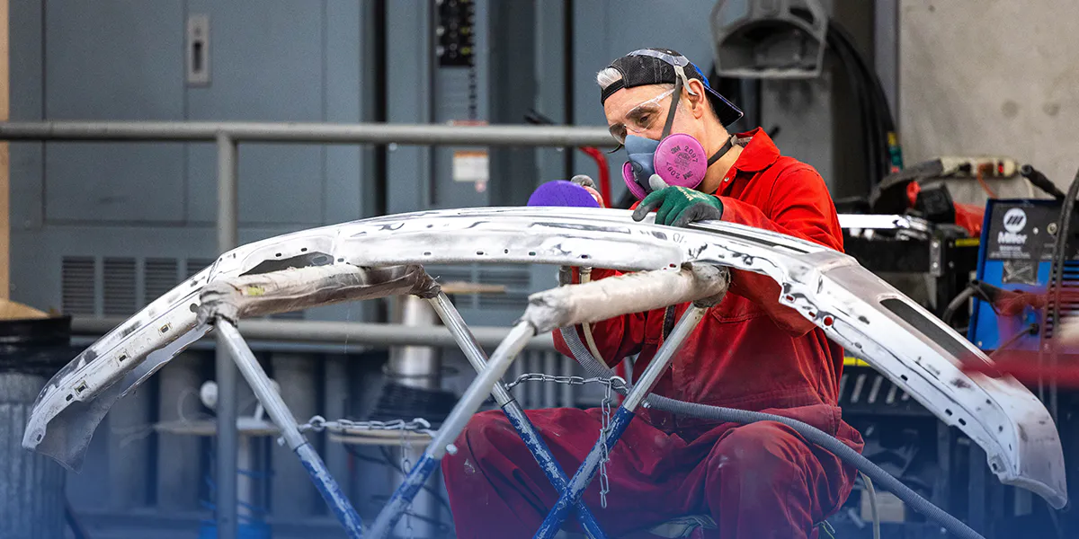 Damaged vehicle bumper being repaired in Calgary