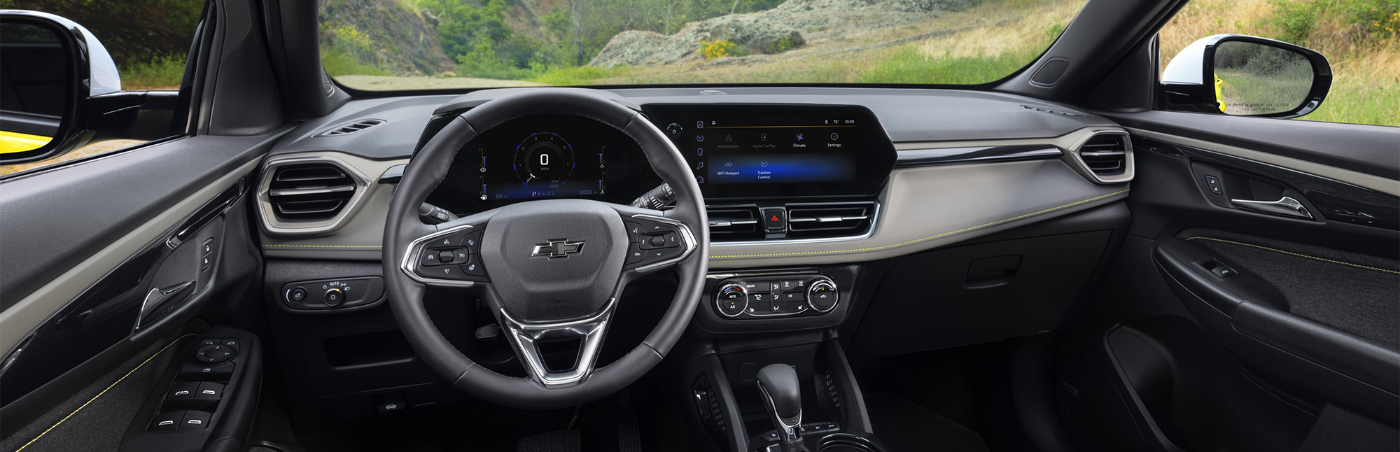 Steering wheel and front screens inside 2025 Chevrolet TrailBlazer.