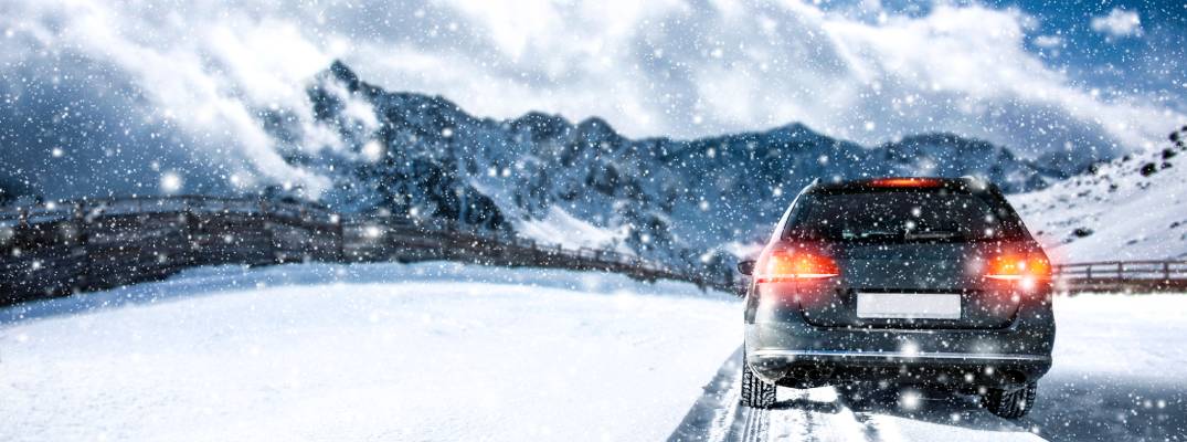 Vehicle driving in the snow. 