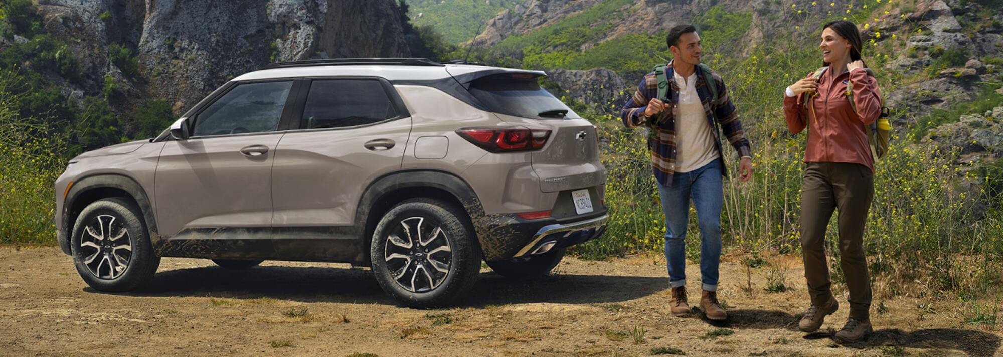 2026 Chevrolet Trailblazer parked on grassy terrain with people nearby