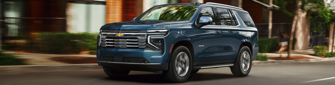 2026 Chevrolet Tahoe driving down road